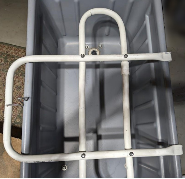 Hay float bar — holds hay below water level